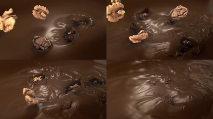 核桃在4k超慢动作中溅到液态牛奶巧克力中