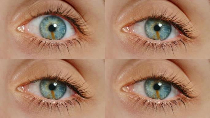 放大蓝眼睛，妇女和视力与视网膜安全，睫毛膏或化妆化妆品在面部皮肤。带有隐形眼镜的模型眼睛上的细节，眨