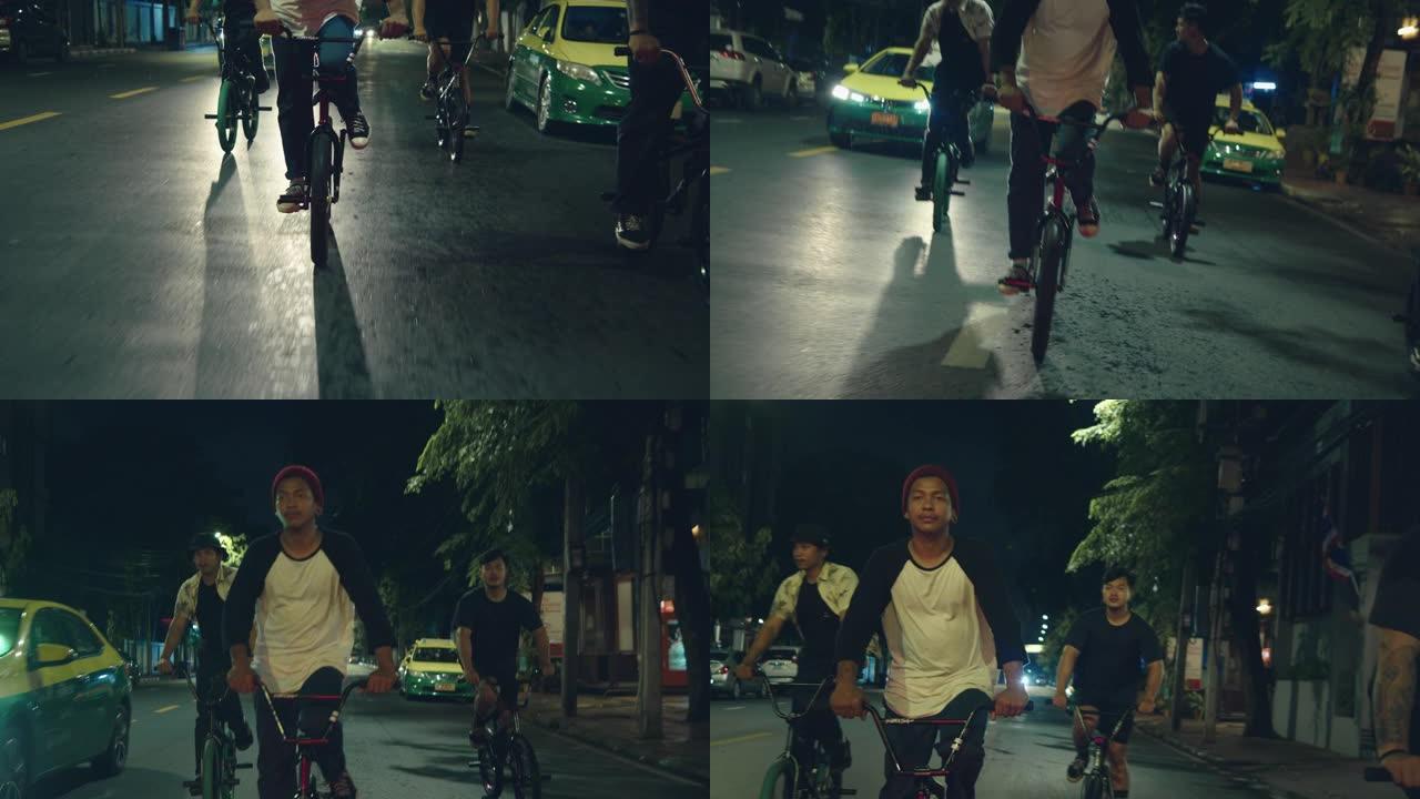 十几岁的男孩在城市骑自行车。