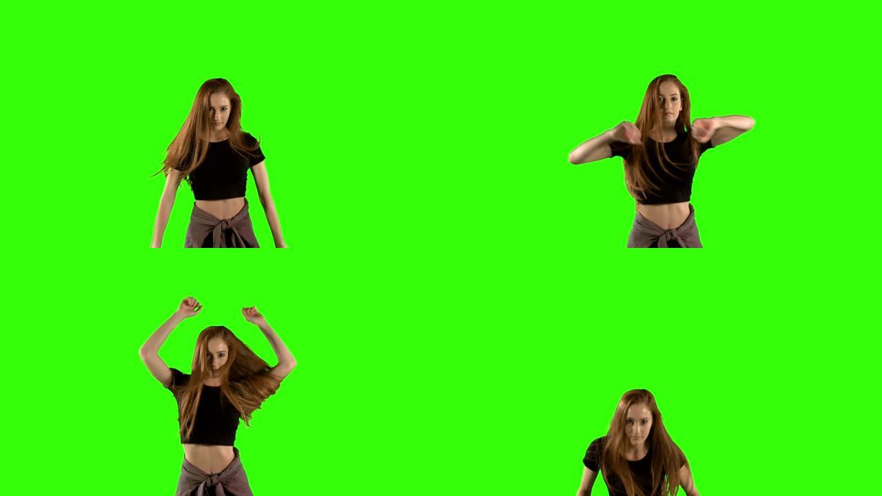 年轻女子在绿屏背景下跳舞