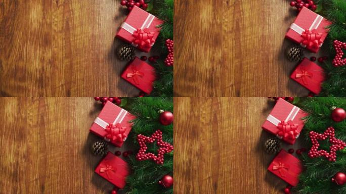 木制背景上带有礼物和复制空间的圣诞节装饰视频