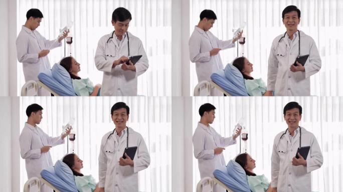 亚洲医生男性经验丰富的医生，一边看着相机独自在诊所摆姿势，一边自信地微笑。医生在视频会议上看。工作骄