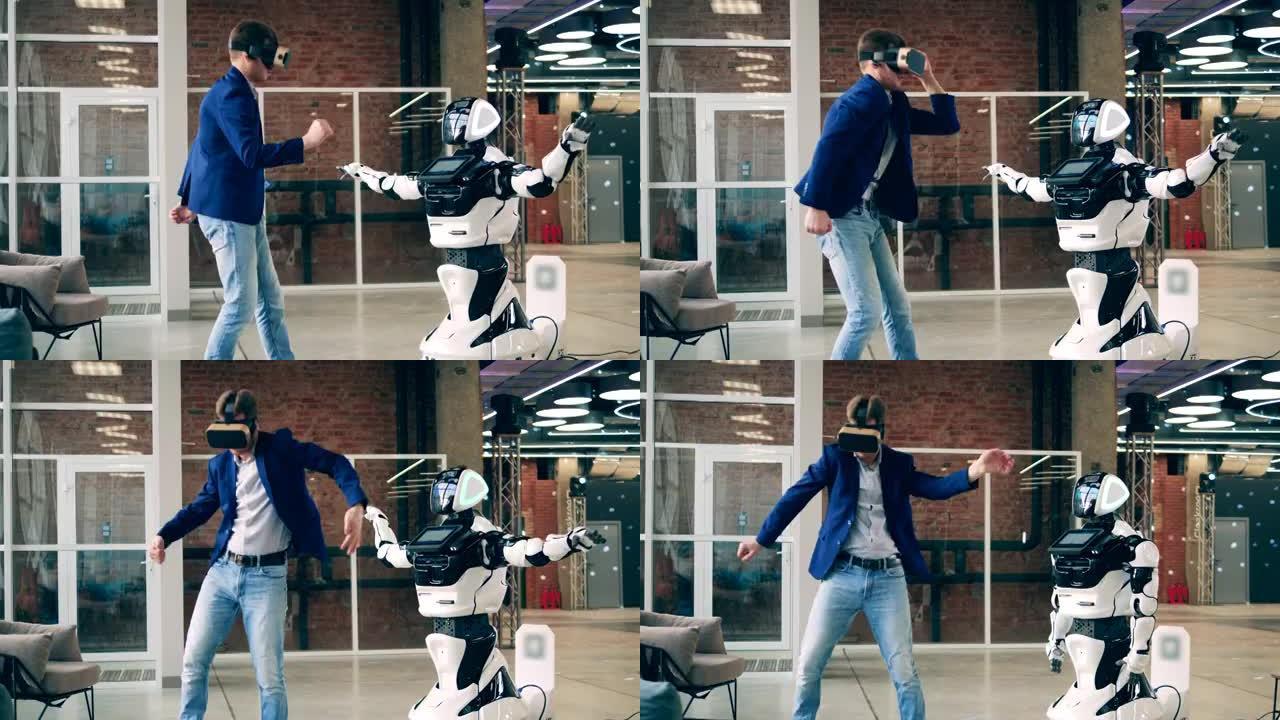 一个戴着VR眼镜的男人正在和机器人跳舞。人工智能、机器人创新、机器人概念。