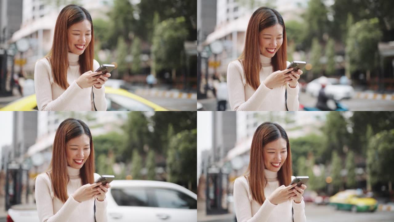 使用智能手机的亚洲女性