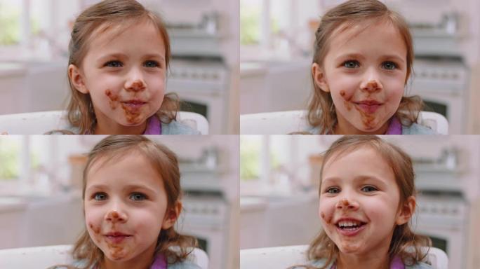凌乱，巧克力和女孩在厨房里的脸，用于食物，糖果和早餐。幸福，甜点和漫画，在家里的孩子嘴里吃糖果，吃糖
