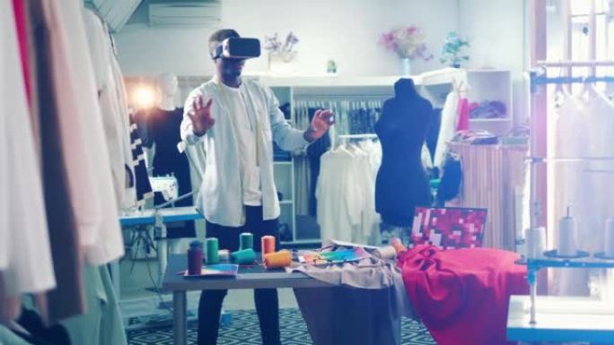 非洲设计师正在裁缝中使用VR眼镜