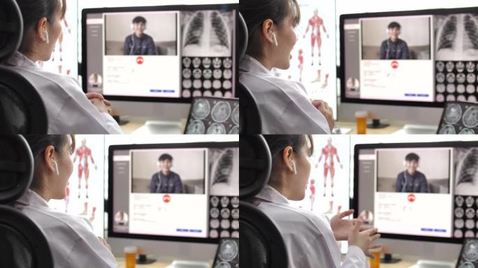 医生在医院的计算机上通过视频通话与患者交谈，远程医疗概念