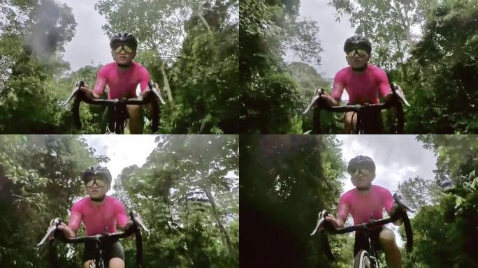 亚洲华裔男运动员独自在农村地区骑自行车