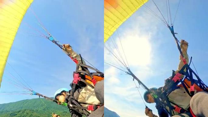 空中的女人滑翔伞滑翔伞跳伞运动自拍照飞行