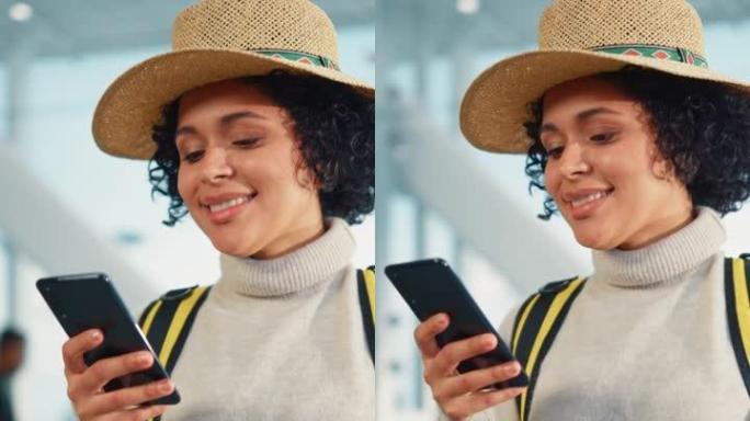 垂直屏幕。机场航站楼: 快乐旅行的黑人妇女在登机口等待登机，使用移动智能手机，在互联网上检查旅行目的