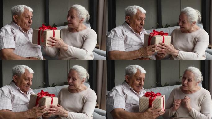 老年妻子用禧年问候丈夫给生日礼物