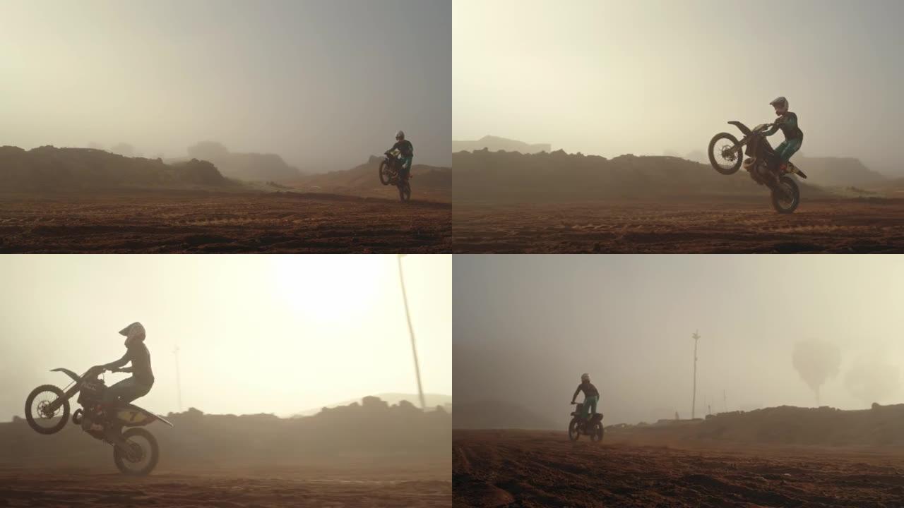 摩托车或摩托车比赛或体育赛事在室外的沙子或灰尘中的土路上。在专业的越野赛车表演或训练，练习或试驾中，
