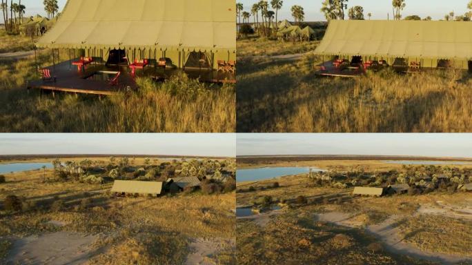 空中缩小带游泳池的私人帐篷的视野，博茨瓦纳Makgadikgadi平底锅上的野生动物园小屋杰克营地