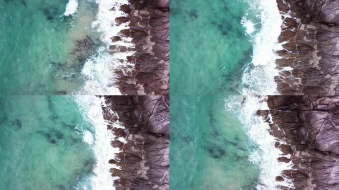 泰国普吉岛岩石海滩和蓝色大海的鸟瞰图