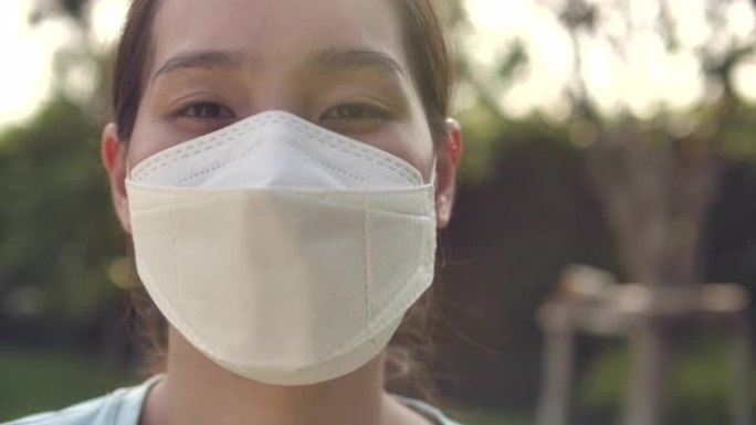 戴着防护医用口罩的亚洲女性肖像