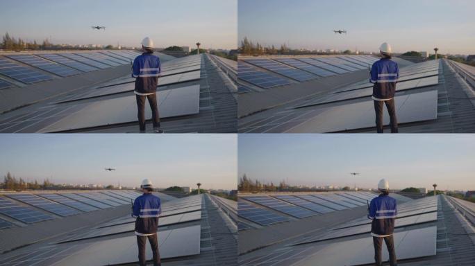 亚洲工程师服务和无人机检查员检查太阳能电池