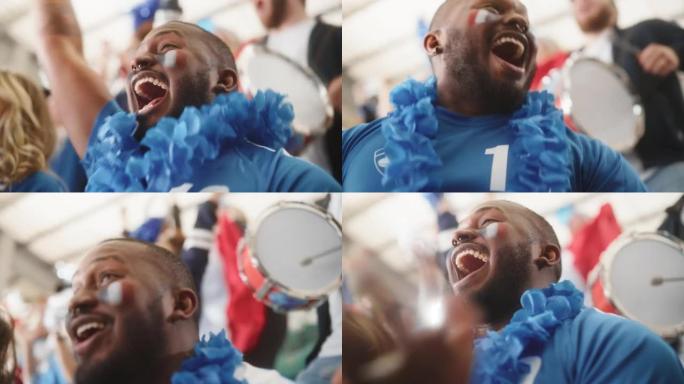 体育馆大事件: 英俊的黑人欢呼。一群满脸彩绘的球迷大喊他们的蓝色足球队获胜。人们庆祝进球，冠军胜利。