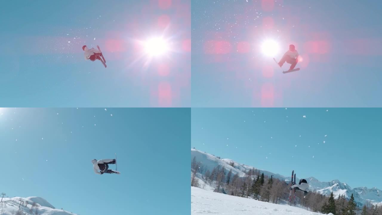 慢动作: 男子滑雪者在白雪皑皑的滑雪区的雪公园跳高空中踢脚