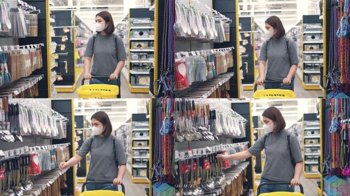 戴着医用口罩的女人在超市里用杂货店推车走路