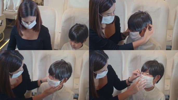 母子在飞机上戴上防护面罩，慢动作