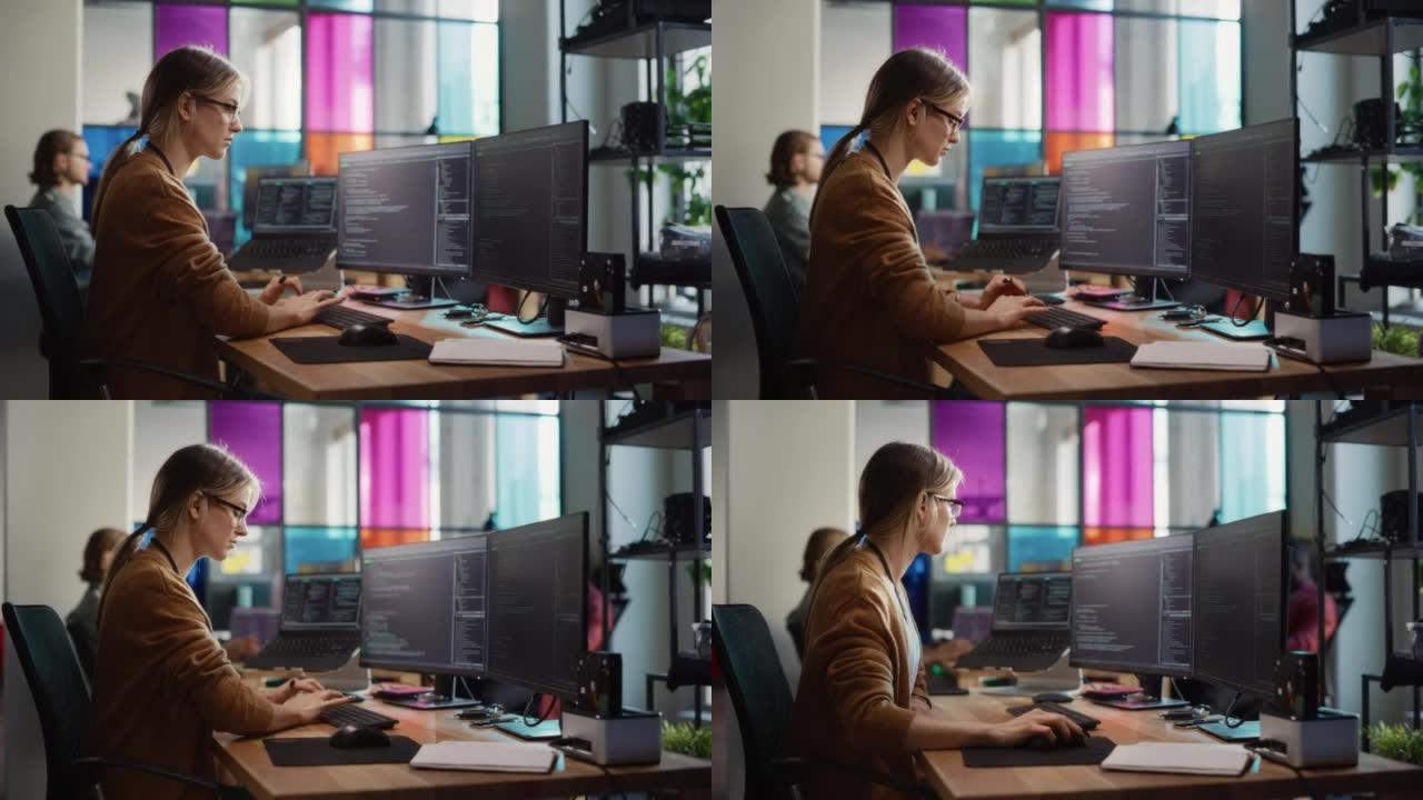 白人女性在台式电脑和笔记本电脑上编码，在宽敞的办公室里有多个显示器。女初级软件工程师，致力于启动移动