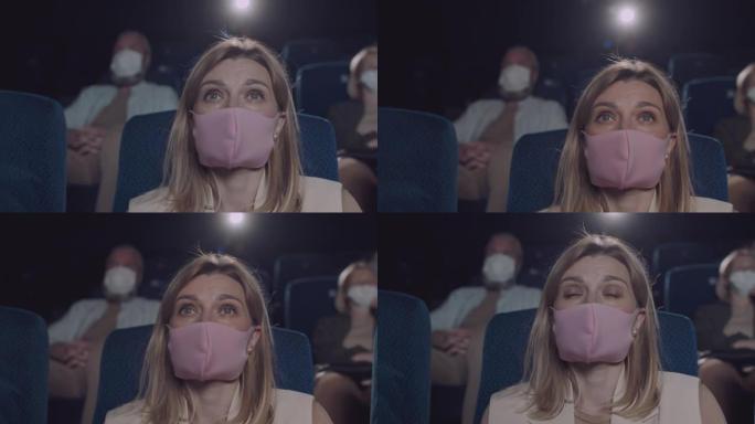 戴面具的女人看电影