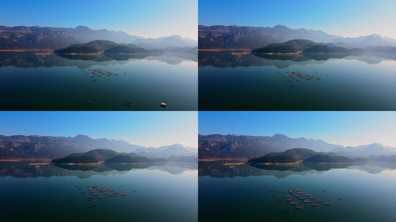 山里美丽的湖里的养鱼场。空中射击，卡拉卡伦，布卡克，布尔杜尔，图尔基耶