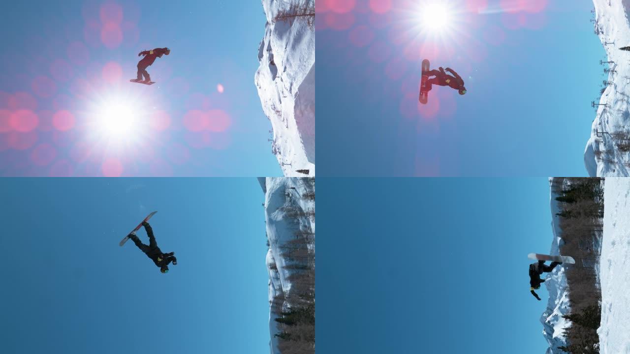 垂直: 明亮的冬季阳光照在一名做后空翻的男性滑雪者身上。