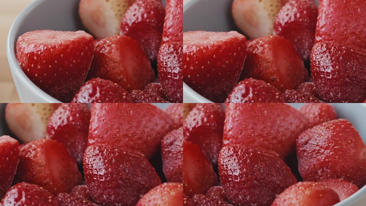 草莓碗的特写冰冻草莓特写视频素材