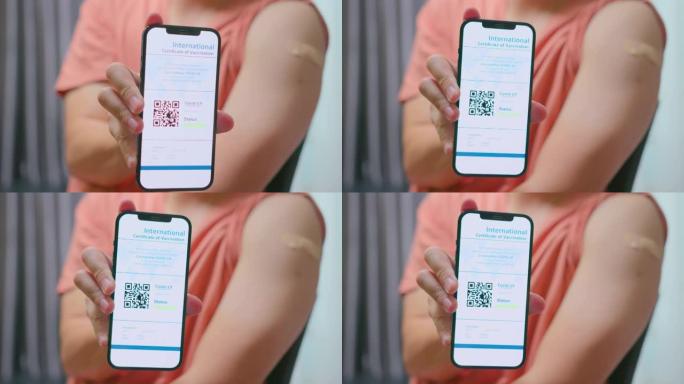 特写亚洲男子在接种疫苗后在智能手机上展示国际新型冠状病毒肺炎疫苗接种证书