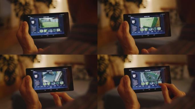 男子通过家庭中心检查安全摄像头