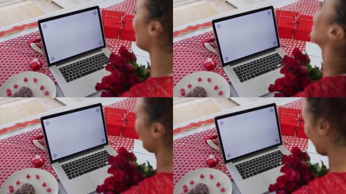 情人节约会视频通话中的混血女人，手持粉红玫瑰
