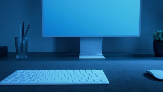 办公室中的3D渲染工作场所，带有白色计算机显示器和黑暗房间桌子上的键盘