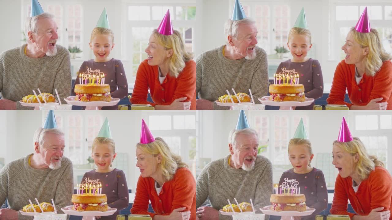祖父母与孙女一起在家里庆祝生日