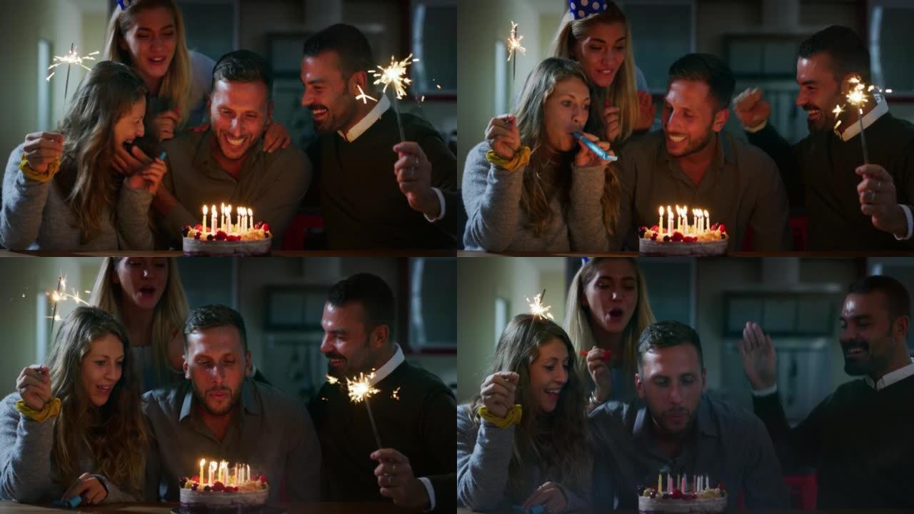 真实的快乐朋友的照片在他们的朋友生日庆祝聚会上在家里玩得很开心。生日男子正在吹着蛋糕的蜡烛。友谊，假