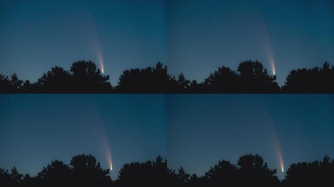 夜星天空背景上彗星的飞行。时间流逝