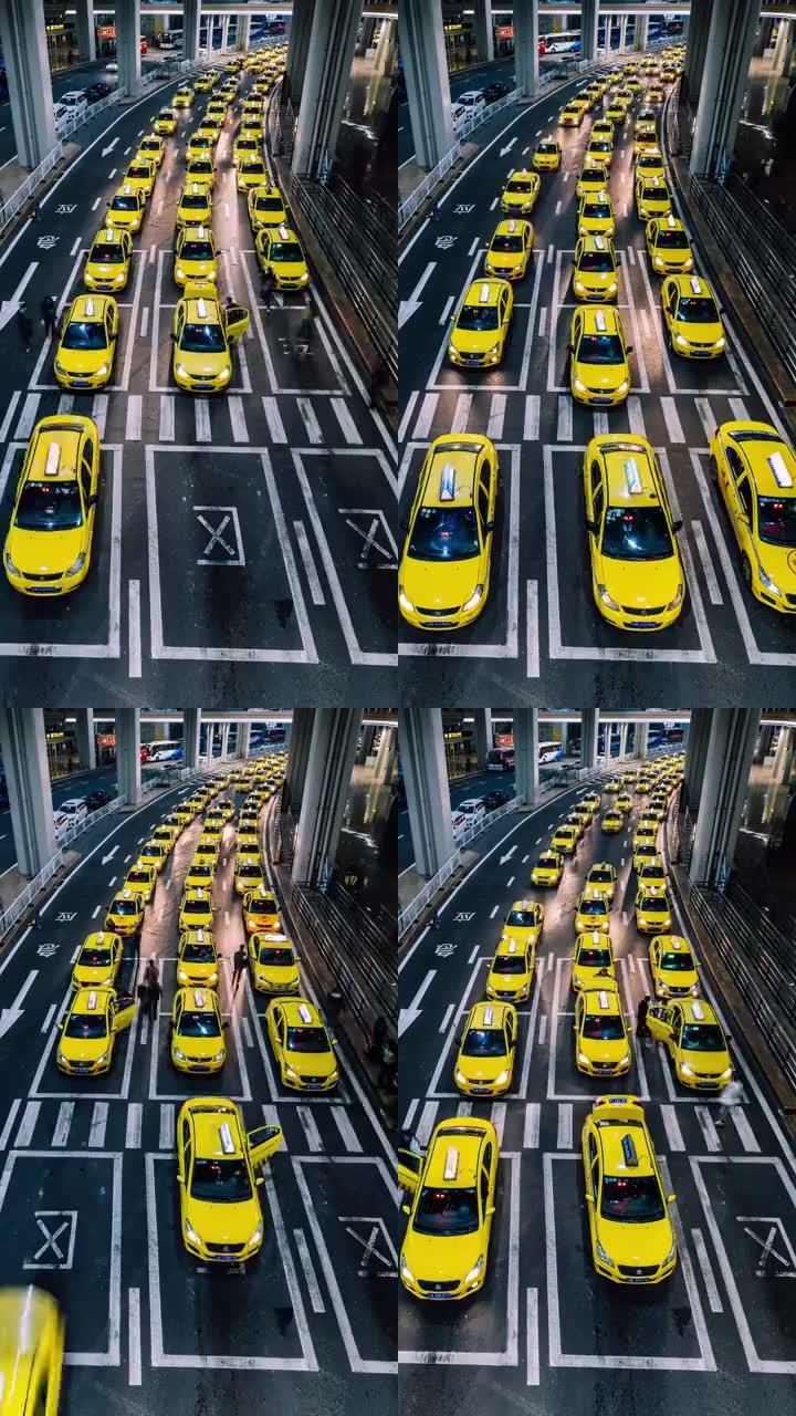 晚上机场出口处的T/L繁忙的出租车排队