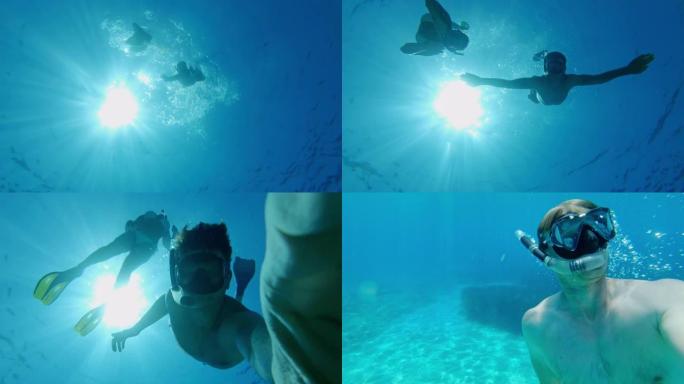 女士夫妇在克罗地亚亚得里亚海阳光明媚的蓝色海洋中浮潜