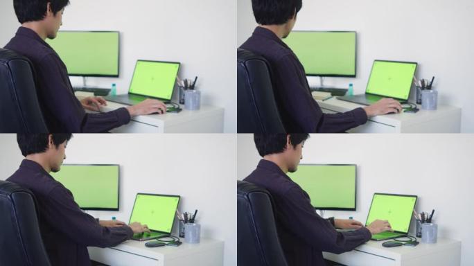 商人在办公室工作时使用计算机