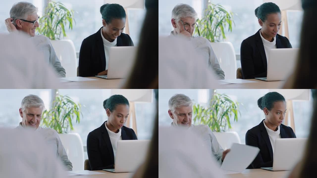 美丽的女商人在董事会会议上使用笔记本电脑与同事一起在公司项目上工作坐在桌子旁规划办公室4k的成功策略