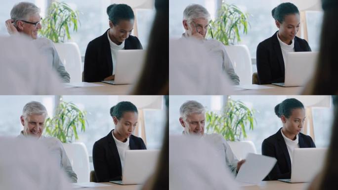 美丽的女商人在董事会会议上使用笔记本电脑与同事一起在公司项目上工作坐在桌子旁规划办公室4k的成功策略