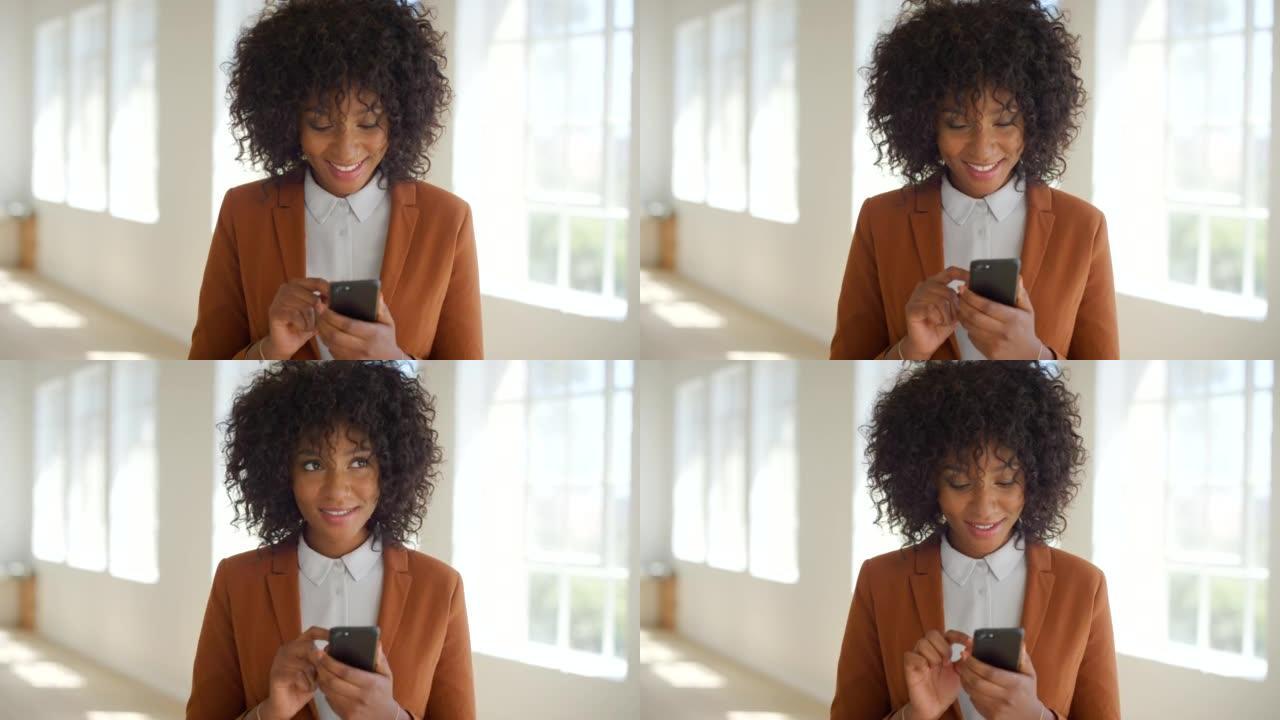 与非洲裔的女商人使用电话，思考和发短信给客户的谈判交易。时髦，冷静和自信的企业家微笑，建立网络并在办