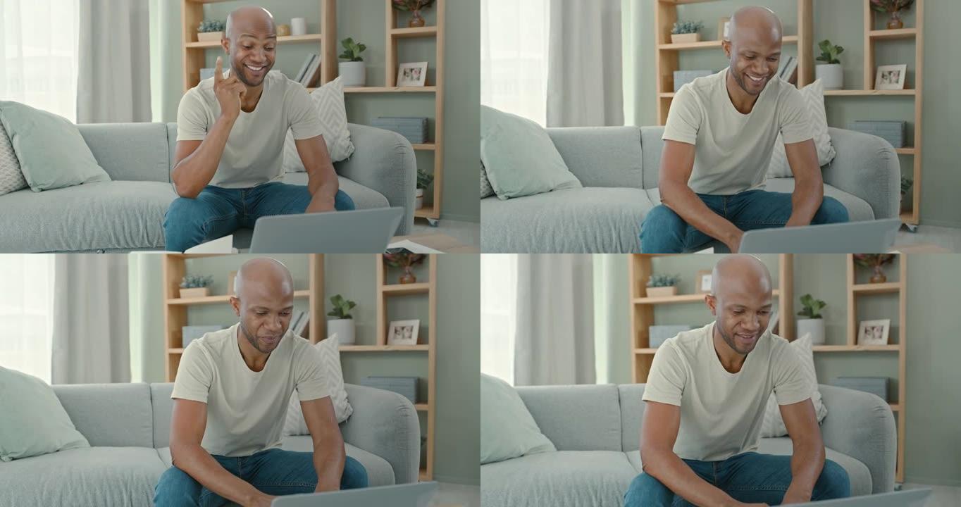 一名男子坐在家里使用笔记本电脑的4k录像