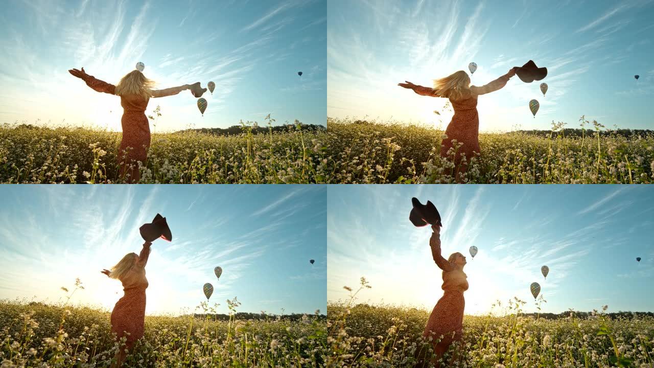 时间扭曲效应女人在热气球前的花田里纺纱