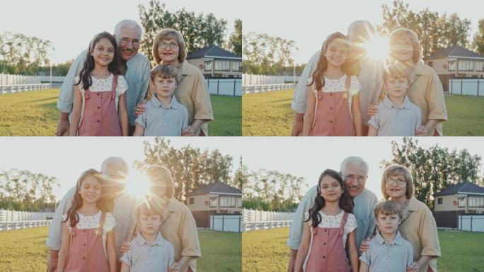 夏天的祖父母和孩子肖像
