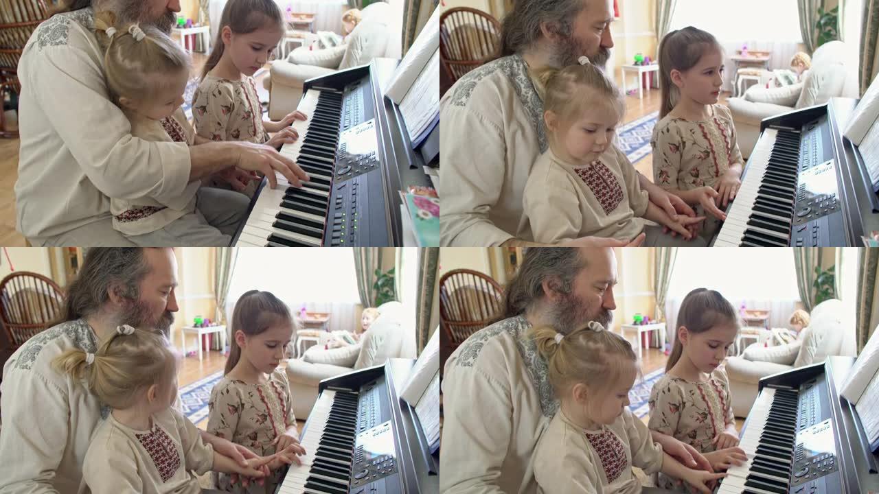 与资深父亲一起弹钢琴的孩子