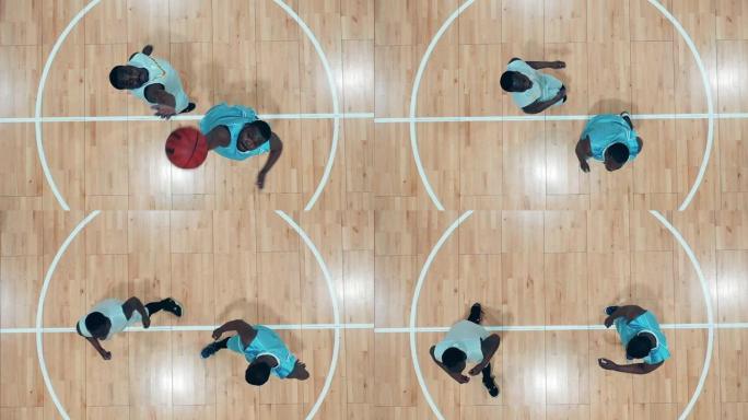 非裔美国球员正在健身房为篮球而战
