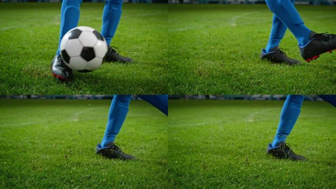 踢足球的靴子腿的特写镜头。职业足球运动员有力地击球，进球，草地飞翔。快速到慢动作电影弧线拍摄。艺术低