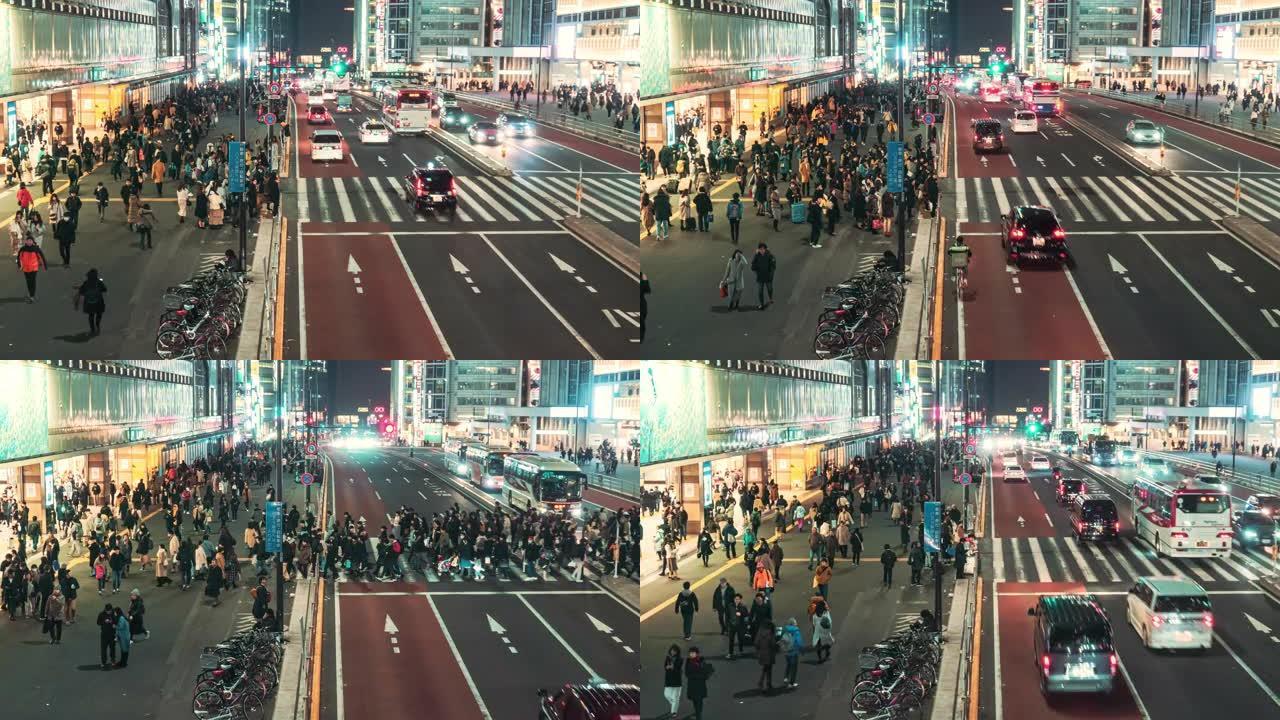 日本新宿东京夜间，人群在街上行走，交通拥挤的时间流逝