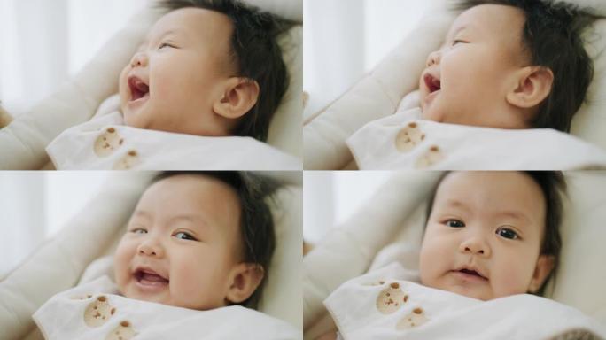 亚洲宝宝快乐和大笑。